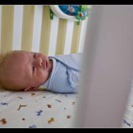 Elias in his crib.